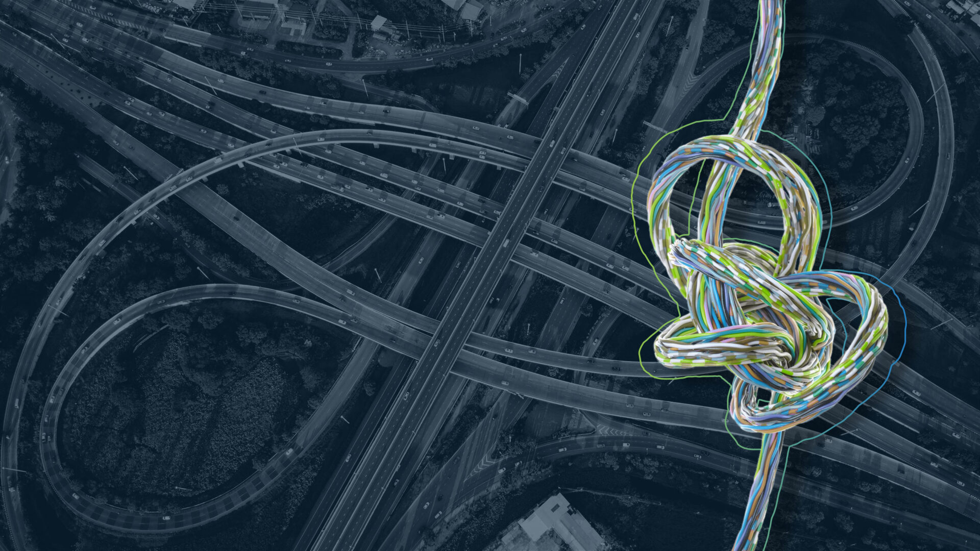 Headerbild zur Seite "Effektives Varianten- und Komplexitätsmanagement": Zeigt einen komplexen Knoten aus Kabeln im Vordergrund und ein komplexes Straßennetz im Hintergrund